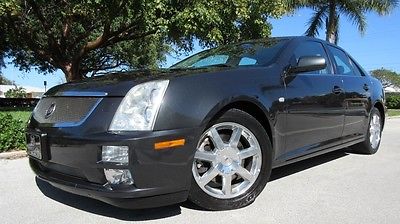 2005 Cadillac STS 4Dr 2005 CADILLAC STS, CDC/SAT/NAV, SUNROOF, CLIMATE LEATHER SEATS, XENON, STUNNING