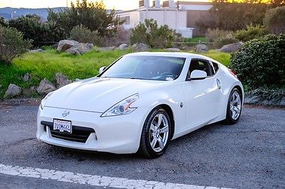 2011 Nissan 370Z -- 2011 Nissan 370Z  44,565 Miles white 2dr Car V6 Cylinder Engine 3.7L 7-Speed A/T