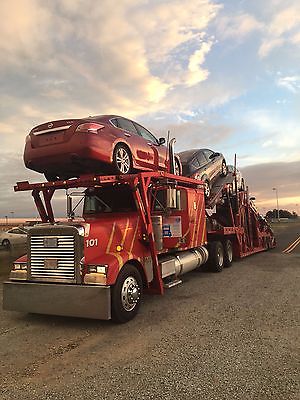 2000 Freightliner Truck with 8-9 Cottrell car hauling trailer