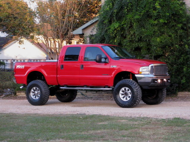 2002 Ford F-350 Lariat CREW CAB SHORT BED (LARIAT) LIFTED! 7.3L DIESEL 4X4... LOW MILEAGE. LIKE F-250