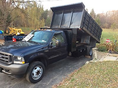 2002 Ford F-550  2002 Ford F550 Stake bed Dump truck flat bed 1owner 93k miles 7.3 Diesel 6 speed