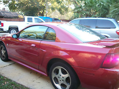 2001 Ford Mustang Base Coupe 2-Door 2001 Ford Mustang Base Coupe 2-Door 3.8 L, RED W/TAN 161,000 MILES FLORIDA CAR