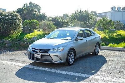 2015 Toyota Camry XLE 2015 Toyota Camry XLE 23,583 Miles Gold 4D Sedan 2.5L I4 SMPI DOHC 6-Speed Autom