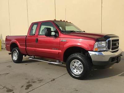 2001 Ford F-250  MUST SEE 2001 F250 SUPERCAB SHORTBED 6 SPEED 4X4 LEATHER 7.3 POWRESTROKE DIESEL