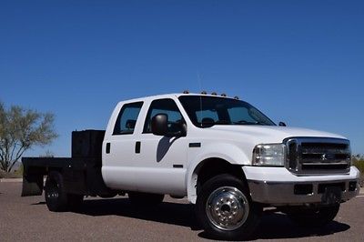 2005 Ford F-550 Crew Cab 4x4 Flat Bed Dually 2005 Ford F-550 Crew Cab 4x4 Flat Bed Dually 165684 Miles White  6.0L V8 OHV 32V