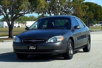 2002 Ford Taurus SEL 35,163 MILES!! CARFAX CERTIFIED~LOADED!! TEXAS EDITION w/ SUNROOF, LEATHER, ALLOYS~CUSTOM EMBLEM & SPOILER! 03 04 05 06