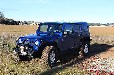 2009 Jeep Wrangler Unlimited Sahara Sport Utility 4-Door 2009 4-Door Jeep Wrangler Unlimited Sahara Model 3.8L V6 with extras!