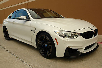 2015 BMW M4 COUPE 6-SPEED MANUAL 3.0L GASOLINE 2015 BMW M4 COUPE 6-SPEED MANUAL 3.0L NAV CAM HEAD-UP DISPLY CARBON FIBER 1OWNER