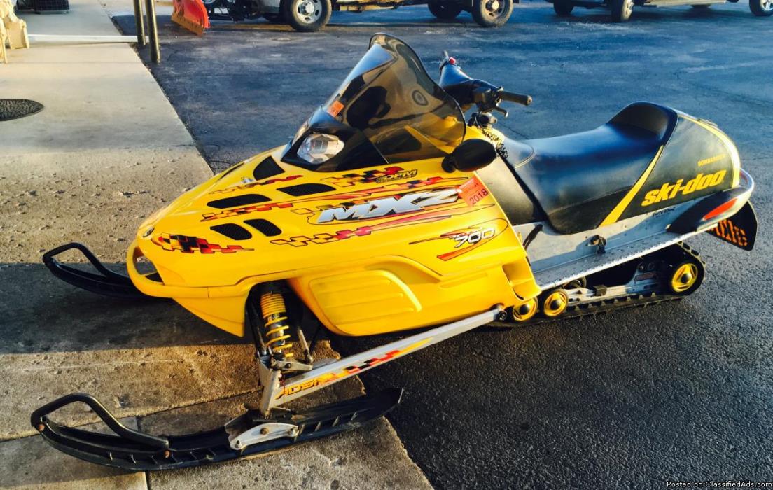 GREAT VALUE! 2002 Ski-Doo MXZ 700 Snowmobile in Yellow and Black now only $1995...