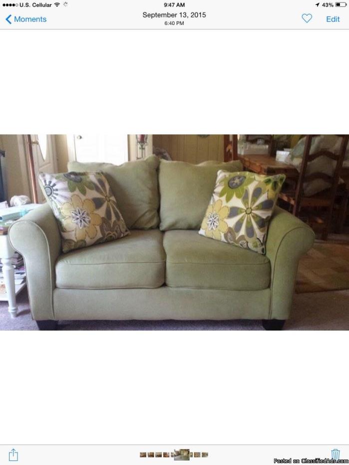 Sofa and love seat with pillows