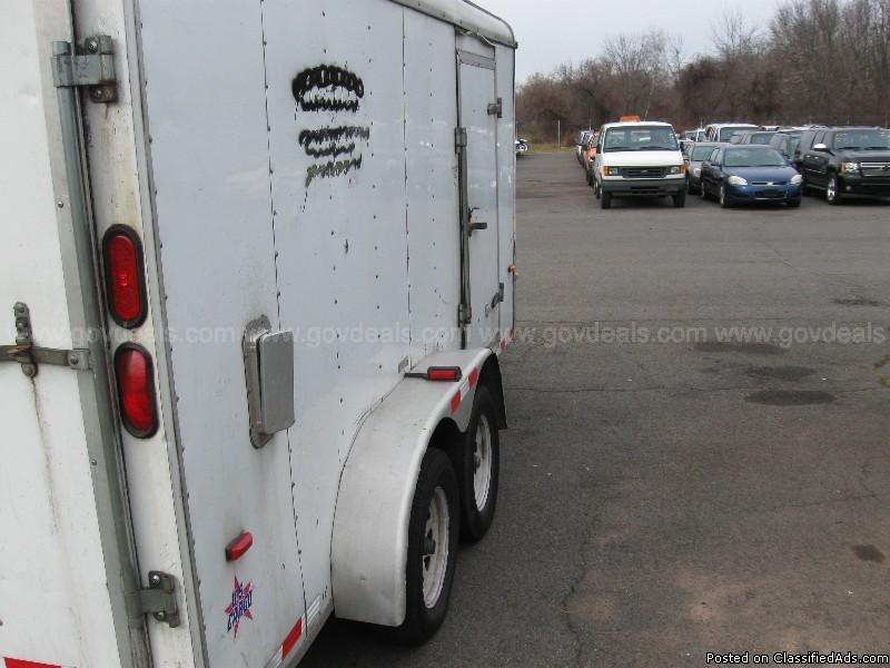 2004 10' X 6' US Cargo Enclosed Trailer with various lawn Equipment, 4