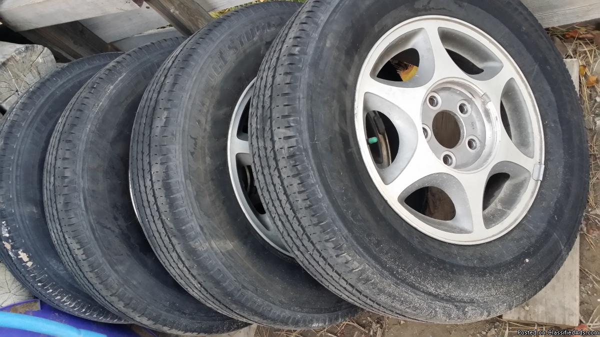 Four 215 70 15 tires