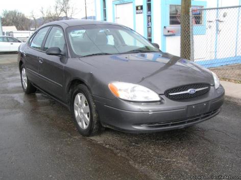 1940 IT LOOKS GOOD IN GREAY NO MATTER WHERE YOU GO:2005 FORD TAURUS SE