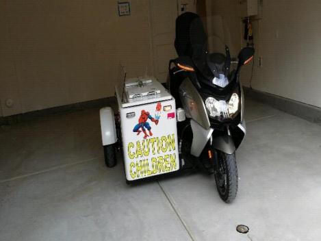 2014 BMW C650GT SCOOTER with an attached ice cream side car
