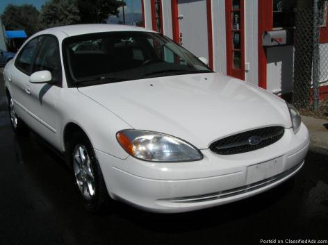2119: THIS WHITE QUEEN WILL DO ER WORK FOR YOU: 2000 FORD TAURUS