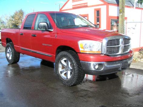 2214 WHO WANT A BIG RED TRUCK? ANYONE! IT NICE!: 2006 DODGE RAM 1500 4X4