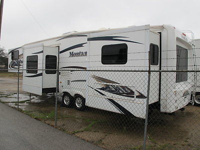 2010 Keystone Montana, model 3750FL, 5 slide luxury 5th wheel, fire place,