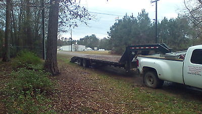 32 ' tandem dually flatbed gooseneck trailer. $ 4500.livingston tx. 9362399613