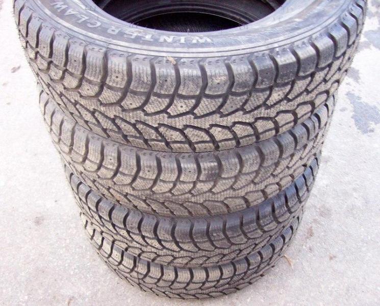 4 USED 2156516 WINTER CLAW SNOW TIRES, 0