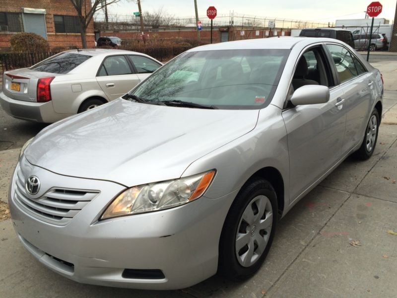 2009 Toyota Camry LE with 112k miles