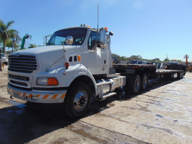 Other Makes COMBINATION STERLING 9500 DAYCAB -2009 TRANSCRAFT STEP DECK EQUIPMENT TRAILER HYDRAULIC TAIL