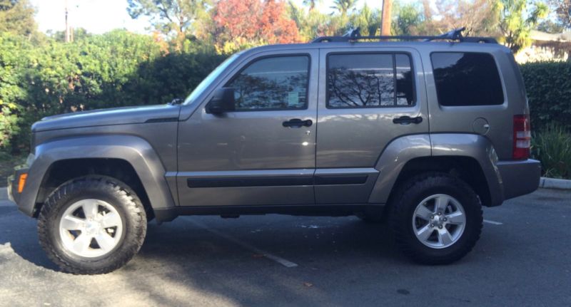 Amazing 2012 Jeep Liberty, lifted, with less than 18k miles!