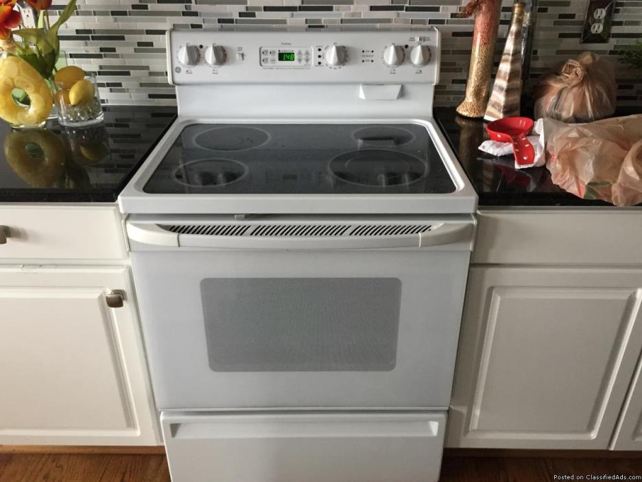 GE Stove,GE microwave Refrigidair side by side Refrigerator with ice and water...