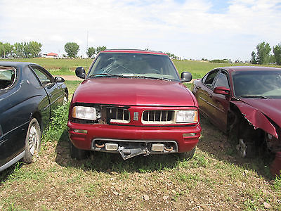 1997 Oldsmobile Bravada Base 1997 Oldsmobile Bravada Red/Tan Abandoned Title No Keys Sold AS IS