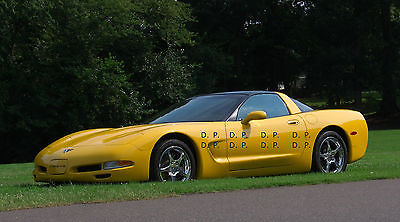 2003 Chevrolet Corvette  2003 Chevrolet Corvette Coupe, both tops and 50th Anniversary badging