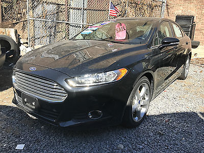 2016 Ford Fusion SE Sedan 4-Door 2016 Ford Fusion SE Sedan Loaded Clean CarFax Back Up Camera Priced To Sell !!!