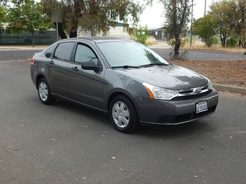 2009 Ford Focus Sedan 5 Speed  35 mpg hwy... Here's How We Roll $250 per mth O.A.C.