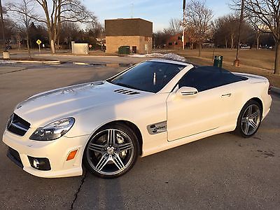Mercedes-Benz : SL-Class SL 63 AMG Excellent condition 2009 SL 63 AMG.   Diamond white over red with carbon fiber t