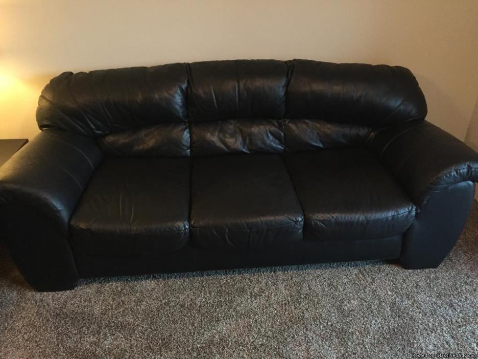 Black leather couch and loveseat, 1