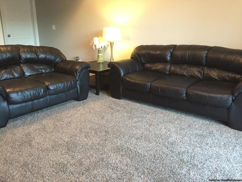Black leather couch and loveseat, 0