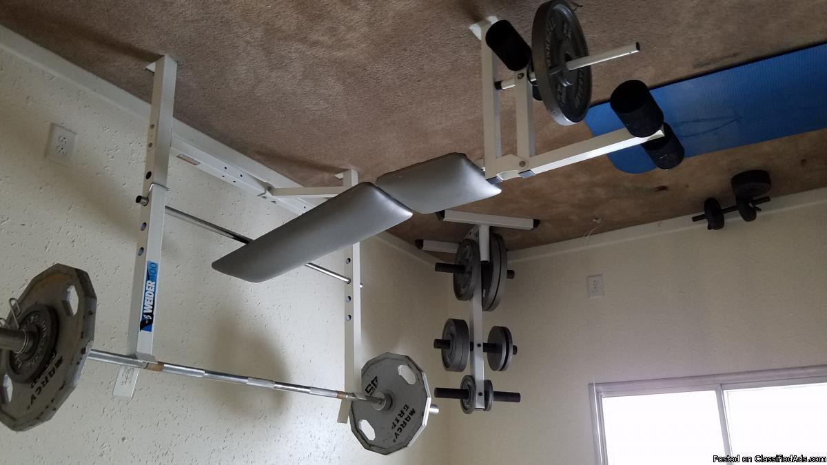 Weider weight bench with weights and weights holder