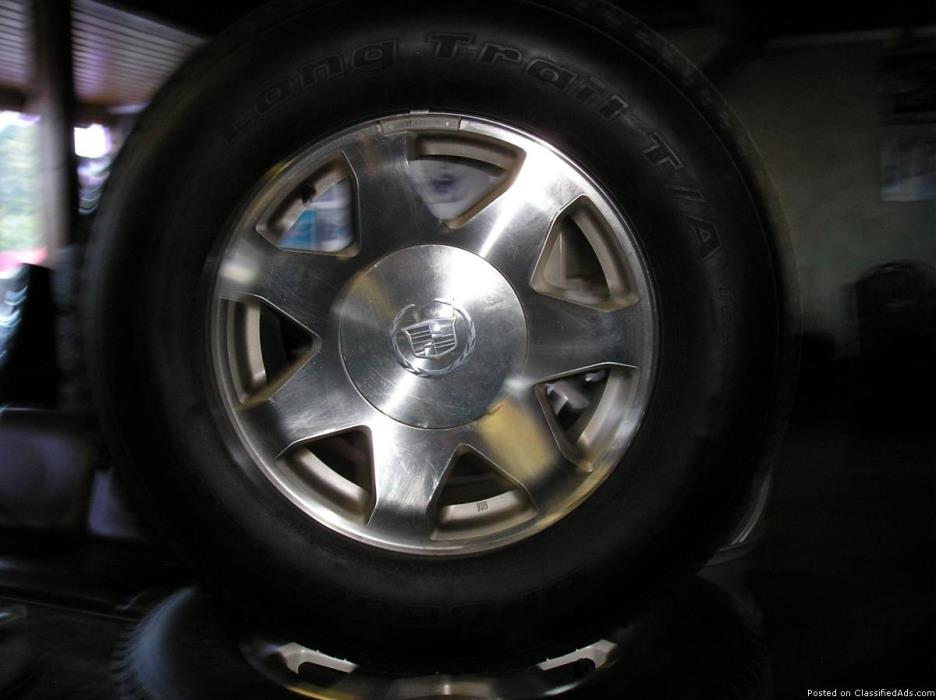 4 17 inch caddillac escalde wheels and tires, 0