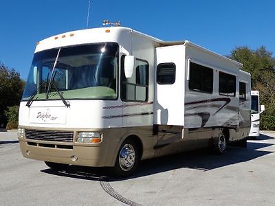 2004 DOLPHIN 35'-2 SLIDES-15K MILES-OUTSIDE TV.-CLEAN COACH-WOW!