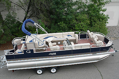 New 24 ft Pontoon boat with a 350 hp four stroke Mercury and trailer.