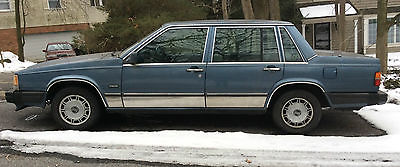 Volvo : 740 GLE Sedan 4-Door 1987 blue volvo 740 and 4 four snow steel wheels