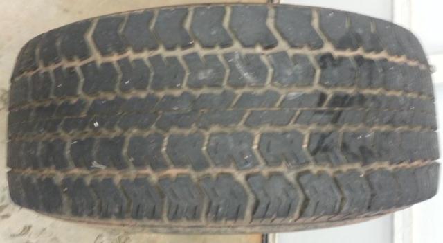 One Uniroyal Laredo AWT 33x15.50R15LT Tire, 1