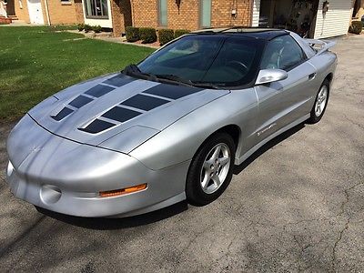 Pontiac : Trans Am 2 door 1997 pontiac trans am lt 1 350 v 8 and t 56 6 speed manual t tops leather headers