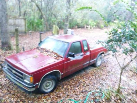 91 chevy s10 red ext. cab. needs work