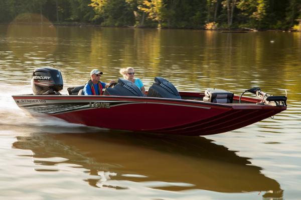 Helm & passenger seats w/molded storage boxes below & 2 fold-down