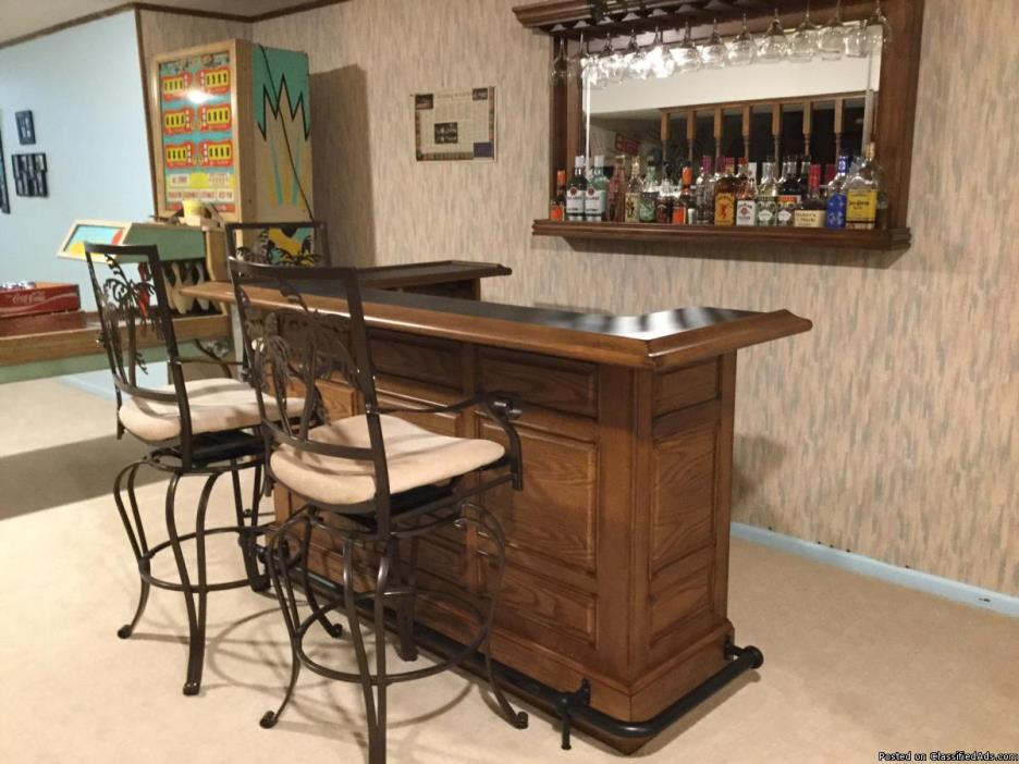 Bar, stools and glass mirror