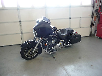 Harley-Davidson : Touring 2006 hd flhxi vivid black excellent condition under 3500 miles on hd rebuild