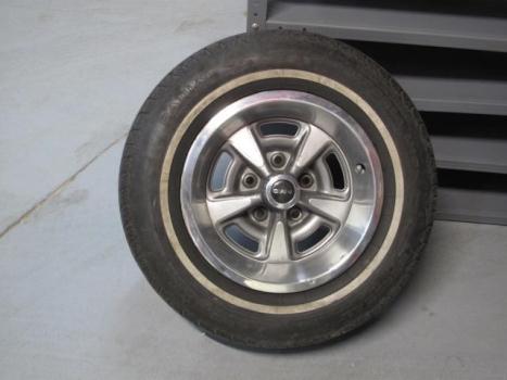 1968 Pontiac 14 Inch Ralley Wheels with tires and trim rings, 1