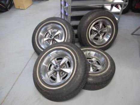 1968 Pontiac 14 Inch Ralley Wheels with tires and trim rings, 0