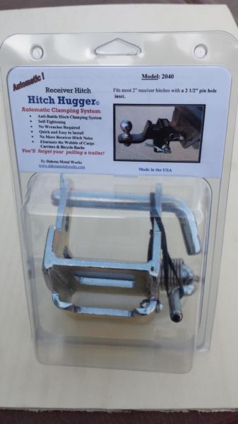 Anti rattle receiver hitch clamping system, 1