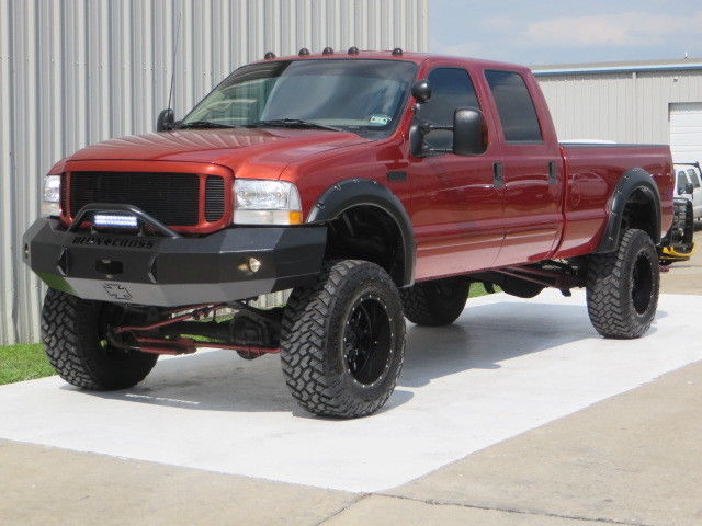 Ford : F-250 7.3 6spd 4x4 01 f 250 lariat 7.3 l powerstroke 6 spd manual lifted camera 37 x 20 chip carfax tx