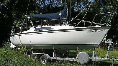 Precision 23 sloop rig, monohull, white w/dark blue trim.